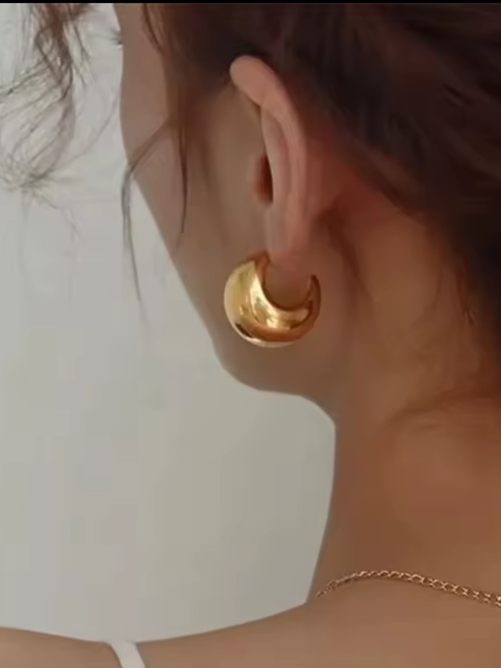 Anthropologie Polished Gold Crescent Hoop Earrings